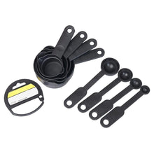 Black plastic measuring set, 8 pieces.