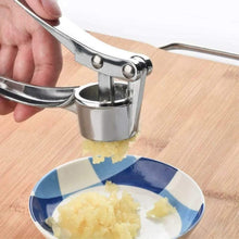 Multi-function masher and squeezer tool